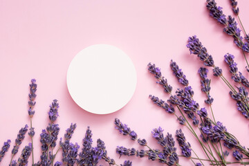 Podium, stage or pedestal with lavender flowers top view. Mock up for cosmetic products .