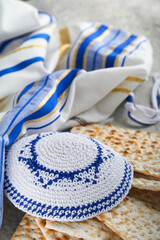 Passover celebration concept. Matzah, red kosher and walnut. Traditional ritual Jewish bread...
