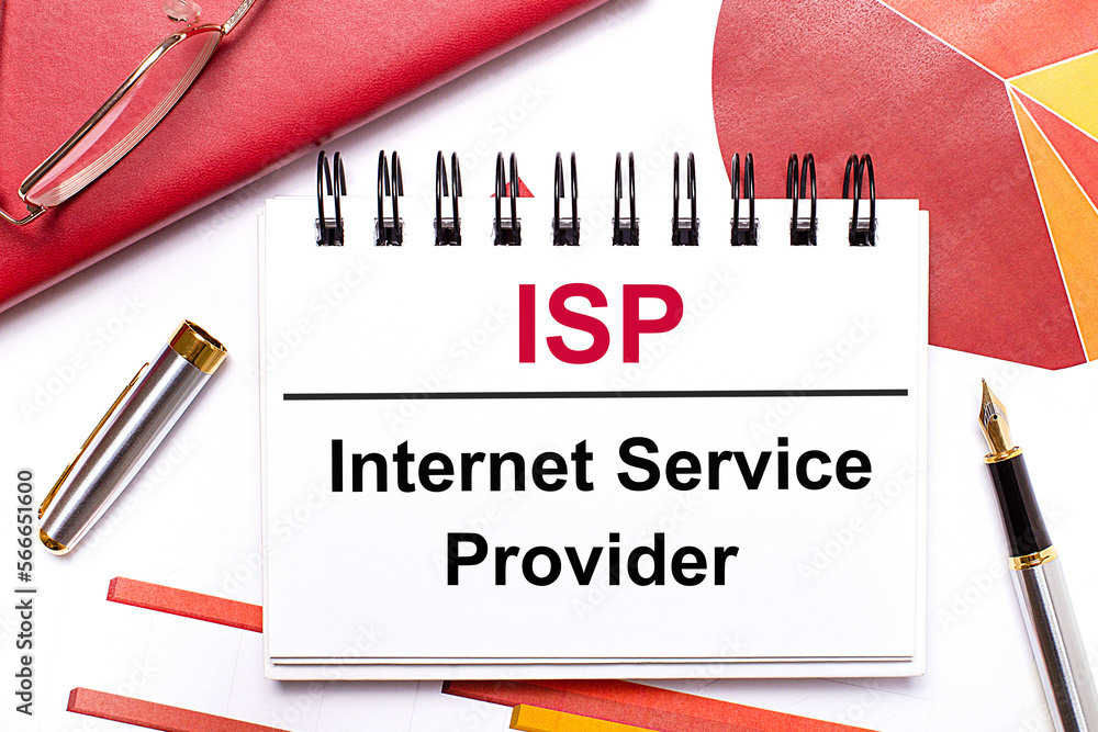 Aufkleber on the desktop is a white notebook with the text isp internet service provider