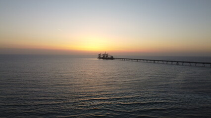 Fototapeta premium Summer sunset views of the Mediterranean sea. Clear blue sky with aerial capture