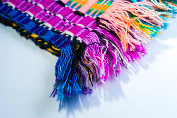 Handmade textile detail made by Guatemalan artisan in Central America, colorful detail full of tradition and culture, colonial history, Mayan cosmovision. 