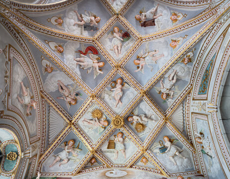 LUZERN, SWITZERLAND - JUNY 24, 2022: The stucco on ceiling of  presbyter in the church Franziskanerkirche by  Gian Antonio Castelli (1626).