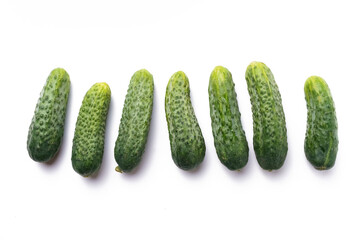Fresh cucumbers isolated on white background, closeup