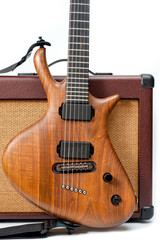 Fototapeta premium An electric guitar and a vintage looking combo amp shot against a white background.