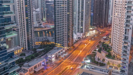 Fototapeta na wymiar Aerial view on Dubai Marina skyscrapers and the most luxury yacht in harbor night to day , Dubai, United Arab Emirates
