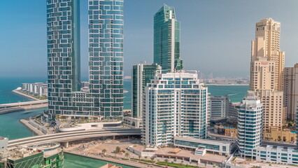 Promenade and canal seen from Dubai marina . Aerial view to JBR district and Bluewaters Island behind