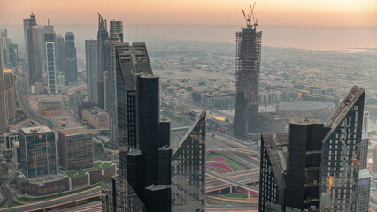 Downtown skyline with modern architecture form above . Aerial view of Dubai business bay towers.