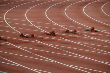starting blocks on start line of 100 meters race
