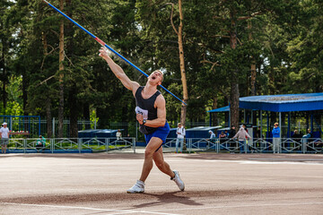 javelin throwing in competition male athlete