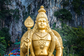 The golden Buddha in front of the Batu Caves, Kuala Lu,pur, Malaysia