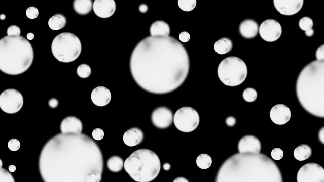 Abstract composition with colored flying spheres on a black background. Glowing decorative