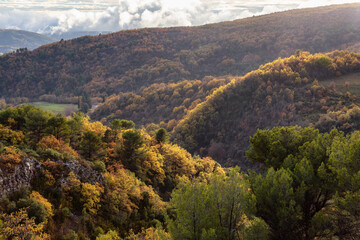 Obraz premium Mountain Landscape with Fall Color Trees. Sunny autumn day. France, Europe. Nature Background