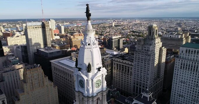 Statue of William Penn on Philadelphia City Hall Tower. Beautiful Cityscape. Business District and Downtown Sunlight. Delaware River. Pennsylvania I