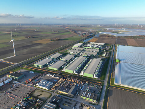 Large scale computing infrastructure, datacenter aerial drone overhead view. Telecommunication server infrastructure.