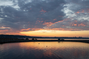 Obraz premium sunset over the river
