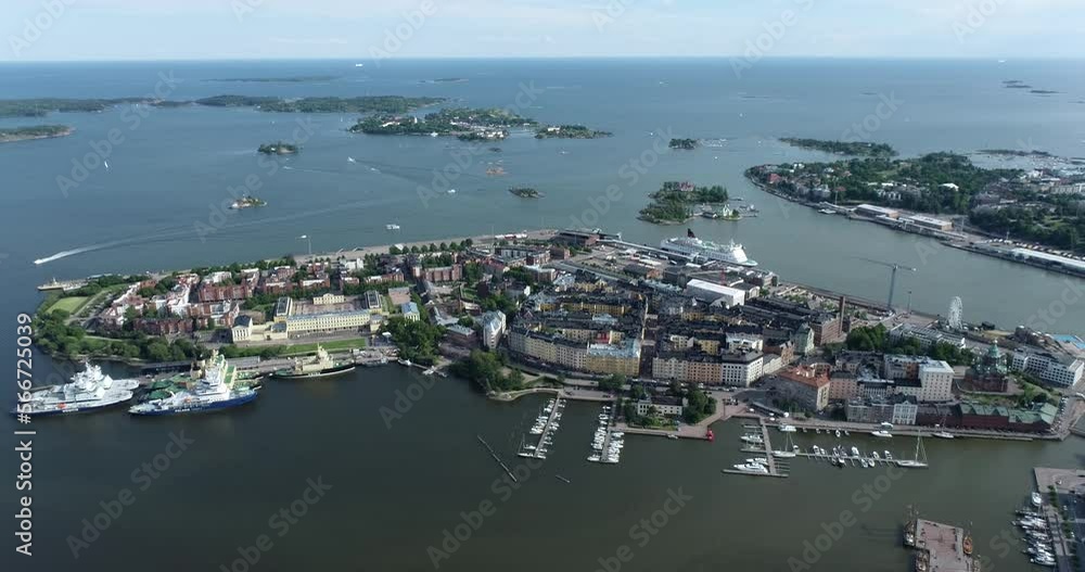 Wall mural katajanokka area in helsinki, finland. beautiful cityscape with harbour and sea in background. drone