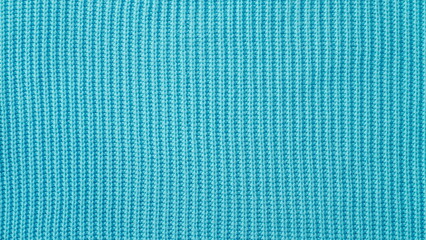 Texture of a knitted woolen fabric. Blue color. Background