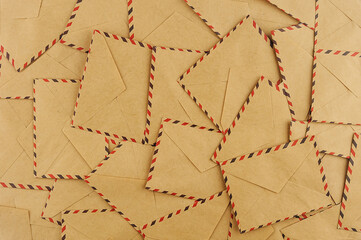 Background from a large number of postal envelopes, top view