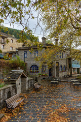 Fototapeta na wymiar The picturesque village of Tsepelovo during fall season with its architectural traditional old stone buildings located on Tymfi mount, Zagori, Epirus, Greece, Europe