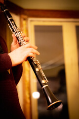 Musician is playing a saxophone at house concert