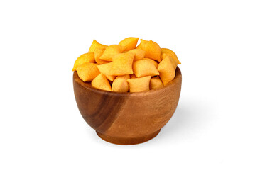 Salty bacon chips on wooden bowl isolated on white background.