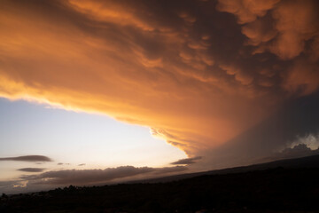 Amazing sky at sunset. Beautiful view of the sky and dramatic clouds with a twilight light. 