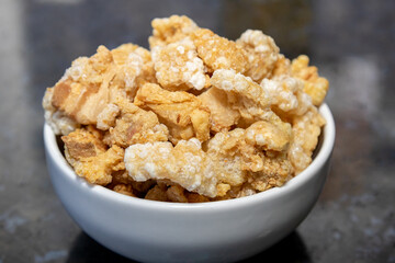 Traditional crackling on dark surface in selective focus