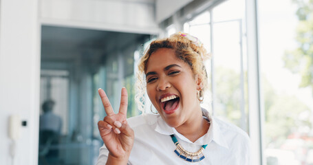 Business woman, peace sign and hands while making a funny face for fun with a positive mindset,...