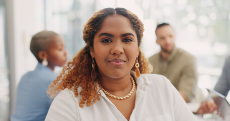 Face of a business woman in meeting with her corporate team in the office. Happiness, success and...