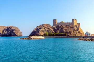 Fototapeta na wymiar View of the Al-Jalali Fort, or Ash Sharqiya Fort, in the harbor of Old Muscat, Oman.