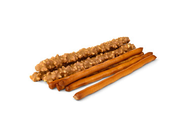Cracker pretzel sticks toffee-cream glazing and peanuts isolated on white background.