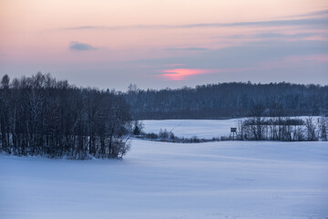 sunny, snowy winter day in the countryside