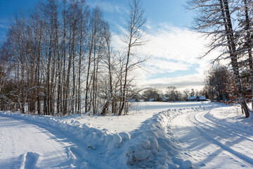 sunny, snowy winter day in the countryside