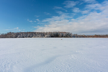 sunny, snowy winter day in the countryside