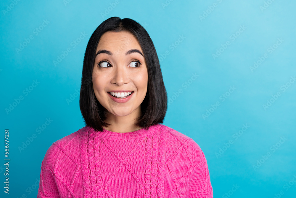 Sticker Photo of pretty positive charming japanese woman smile wear pink knitted look empty space enjoy advertisement isolated on blue color background