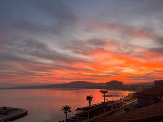 Fantastic orange and purple sky at the sea coast