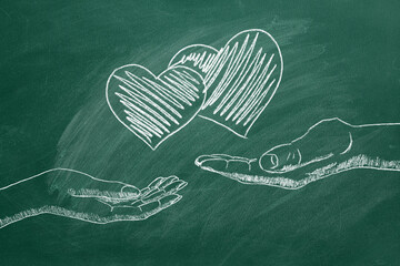 Male and female hands with two hearts. Concept of Love, Life, Care, Compassion, Mercy, Philanthropy, Health. I Love You. Happy Valentine's day. World heart day. Chalk drawn illustration.
