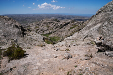 View of the rocky hills seen from the top of the rock massif Los Gigantes in Cordoba, Argentina. 
