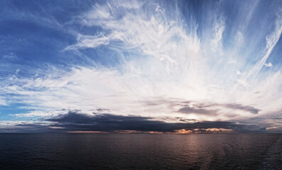 Calm sea with sunset, beautiful sky. Meditation ocean and sky background. Horizon over the water. 