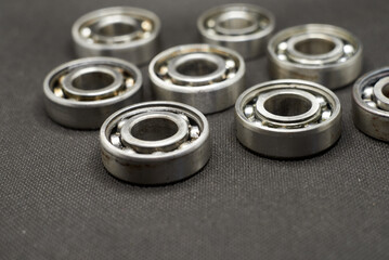 Photo of used bearings on a gray background