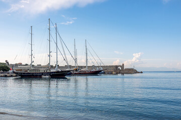 Panoramic view of beautiful yachts stand in harbor in port of Rhodes, Greece. High quality photo