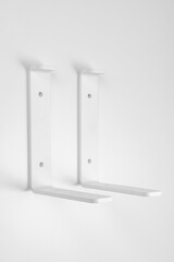 Bracket on a white background. support part for mounting shelves.