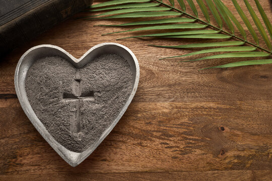 Ash wednesday, crucifix made of ash, dust as christian religion. Lent beginning