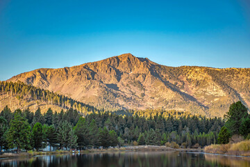Mountain Peak Reflecting on Lake at Sunrise in Lake Tahoe