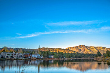 Fototapeta na wymiar Mountain Peak Reflecting on Lake at Sunrise in Lake Tahoe