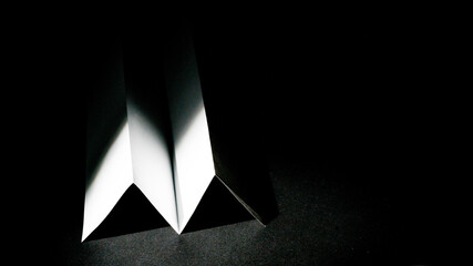 Folded white piece of paper