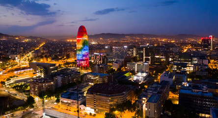 Aerial cityscape of Barcelona with modern Torre Glories skyscraper