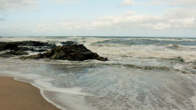 Rocks Sea Beach Waves Pan to Southbroom South Africa KZN