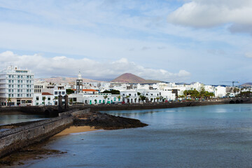 Fototapeta premium Arrecife port city view - capital of Lanzarote, Canary Islands. Cityscape of Arrecife on sunny day horizontal landscape background.
