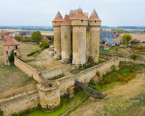 Aerial view of impressive medieval castle of Sarzay located in commune of same name in Indre department, France - obrazy, fototapety, plakaty